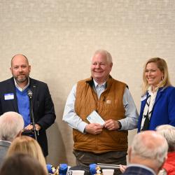 David Wade, center, stands with Bo Drake, left, and Dr. Rebecca Ashford, right.