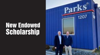 larry and robert parks in front of their company building